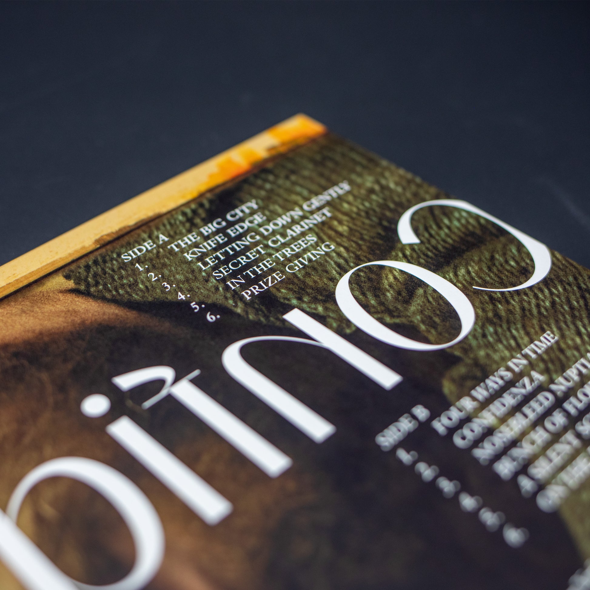 Magazine or book cover featuring the word ’Oinos’ prominently displayed.