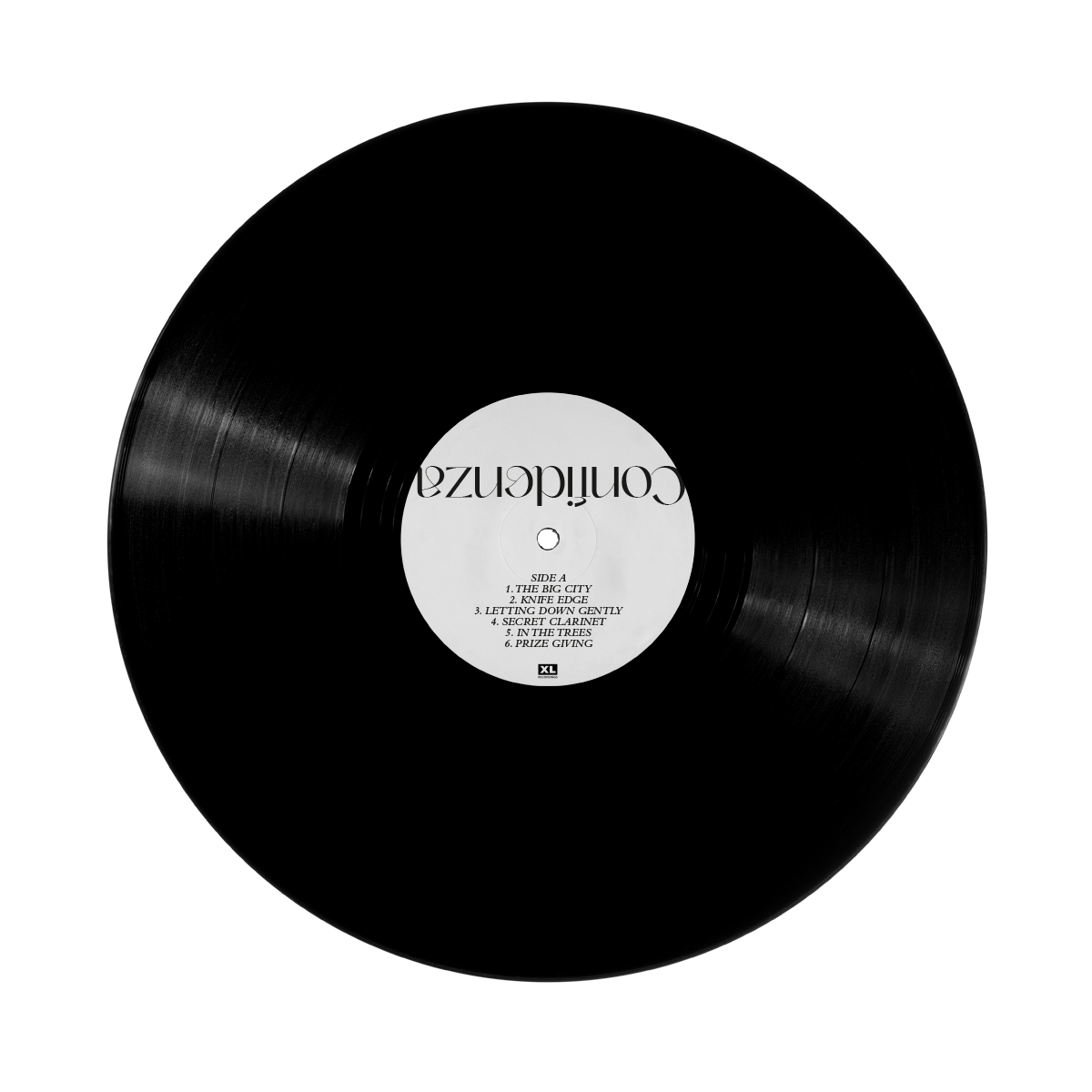 Vinyl record with a white label displaying ’Cortijo’ text.