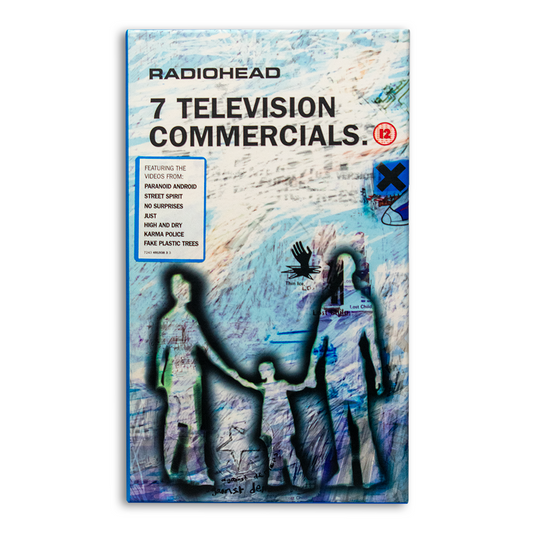 Album cover for Radiohead’s ’7 Television Commercials’ featuring silhouettes of figures against a textured background.
