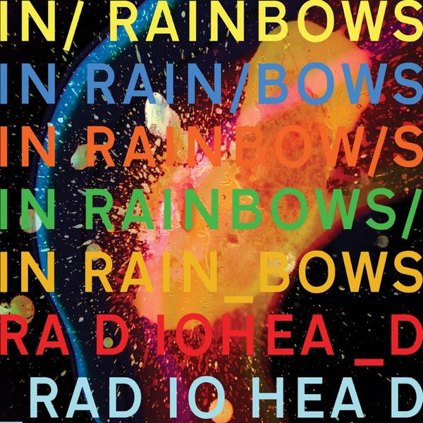 Album cover for Radiohead’s ’In Rainbows’ featuring colorful text repeating the album and band name.