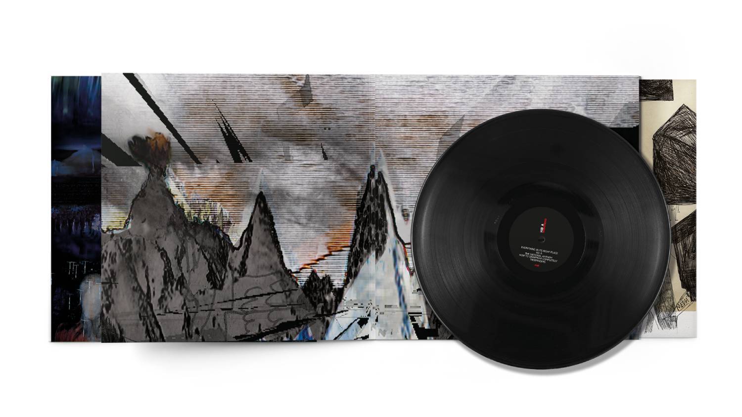 Vinyl record album displayed alongside its album cover artwork.