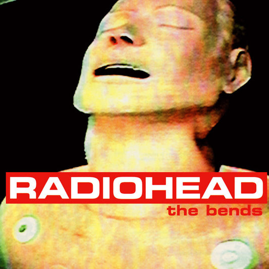 Album cover for Radiohead’s ’The Bends’ featuring a distorted close-up of a person’s face and neck.