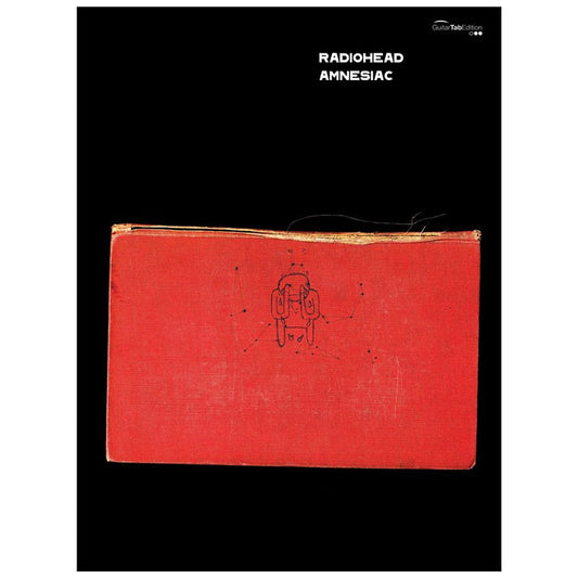 Red book or notebook with a simple sketch on its cover against a black background.