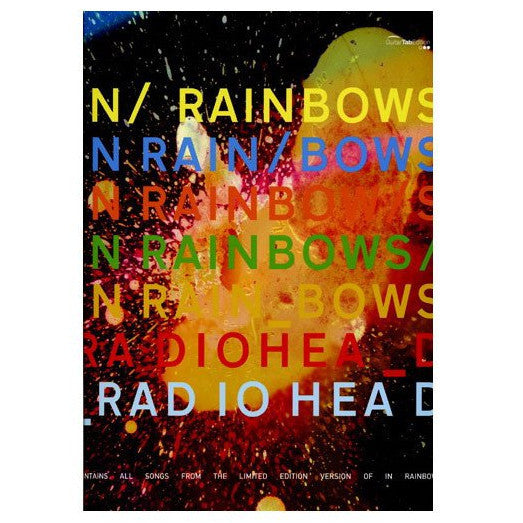 Colorful poster for Radiohead’s album ’In Rainbows’ featuring text in various rainbow hues against a dark, speckled background.
